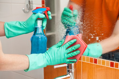 Regular cleaning of kitchen counters and high-touch surfaces