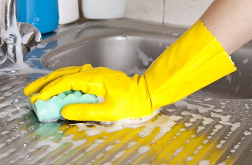 Detailed after builders cleaning of kitchen surfaces and windows
